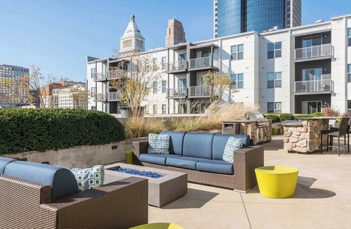 Central Business District Apartment | CozySuites at the Banks gym, pool 16