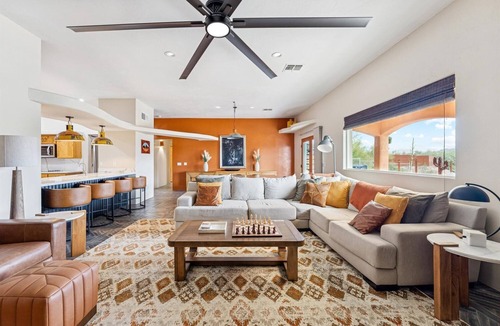 Apache Junction House | Resort-Style Backyard, Heated Pool, Waterslide, Games & Mountain Views!