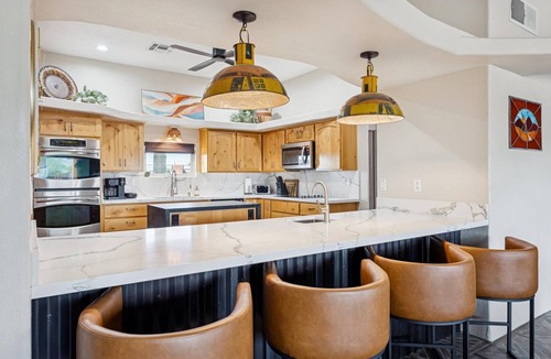 Apache Junction House | Resort-Style Backyard, Heated Pool, Waterslide, Games & Mountain Views!
