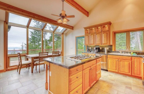 Olga House | Stunning Water View Retreat with Fireplace, Huge Deck, and Jetted Tub