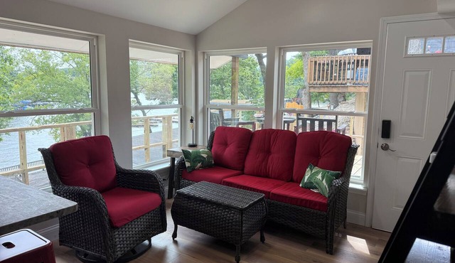 Cozy 800 sq ft A-frame cabin at North Shore Resort with lake views, 1 bedroom + loft (sleeps 6), full kitchen, island seating, and a private deck—perfect for relaxing getaways at Lake of the Ozarks. in Eldon