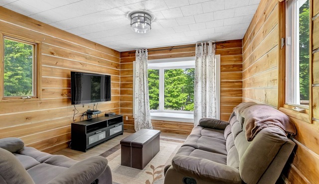 Steps from South Lake, on 9 acres surrounded by Haliburton highlands. in Minden Hills