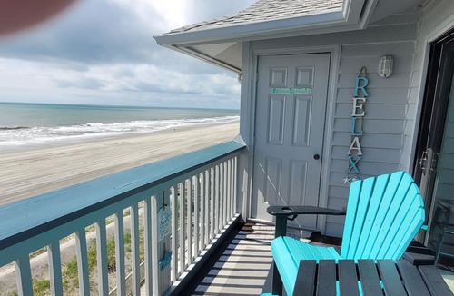 Surfside Beach Condo | Leave your worries behind in this cozy getaway right on the beach!