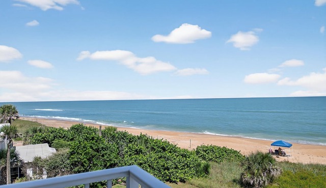 Direct oceanfront 2/2 condo with a private balcony, heated beachfront pool, and garage in Ormond Beach